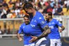 Empoli's Alberto Cerri celebrates after scoring a goal that was later disallowed during the Serie A soccer match between Lecce and Empoli at the Via del Mare Stadium in Lecce, Italy, Saturday, April 13, 2024. (Giovanni Evangelista/LaPresse via AP)