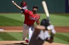 Cleveland Guardians starting pitcher Carlos Carrasco delivers to New York Yankees batter Anthony Volpe during the first inning in the first baseball game of a doubleheader, Saturday, April 13, 2024, in Cleveland. (AP Photo/David Dermer)
