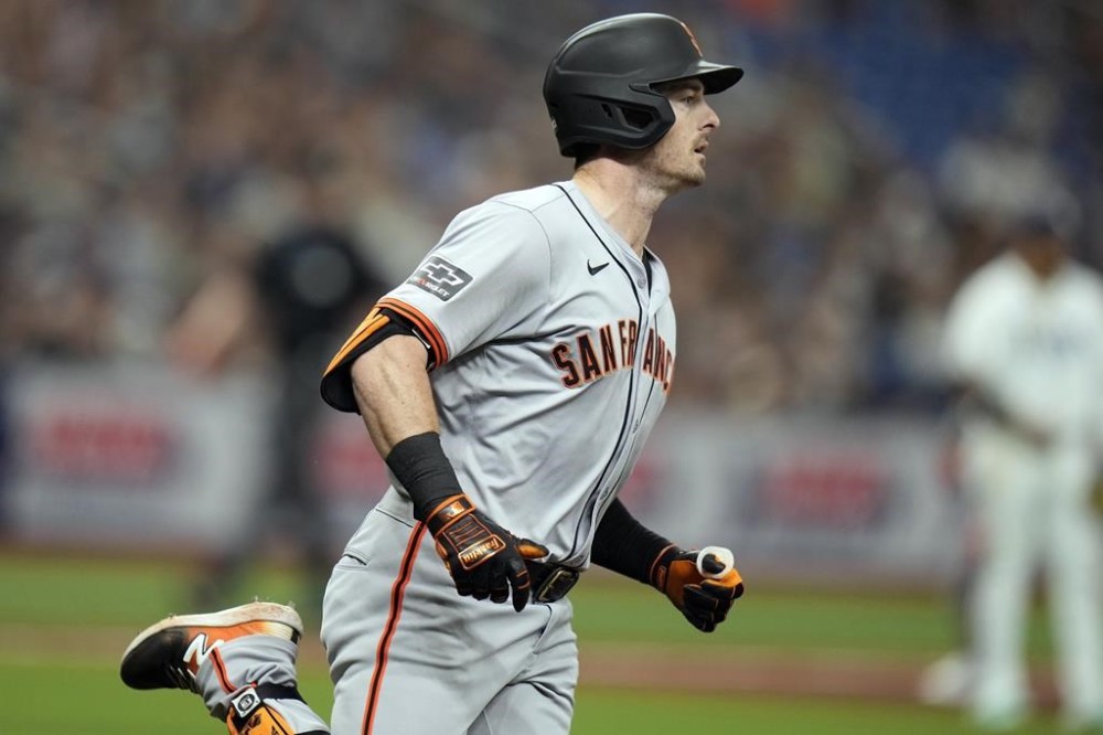 San Francisco Giants' Mike Yastrzemski watches his two-run single off Tampa Bay Rays pitcher Chris Devenski during the sixth inning of a baseball game Saturday, April 13, 2024, in St. Petersburg, Fla. (AP Photo/Chris O'Meara)