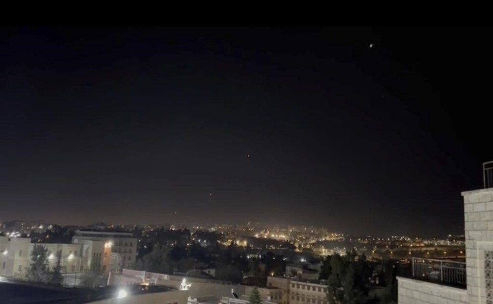 Interceptors missiles are launched into the sky early Sunday, April 14, 2024, in Jerusalem. (AP Photo/Sam Mednick)