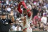 St. Louis Cardinals' Jordan Walker, right, gestures toward his dugout after hitting a triple against Arizona Diamondbacks during the fifth inning of a baseball game Saturday, April 13, 2024, in Phoenix. (AP Photo/Darryl Webb)