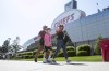 Fans make their way to the stadium prior to an MLS soccer match between Sporting Kansas City and Inter Miami, Saturday, April 13, 2024, in Kansas City, Mo. (AP Photo/Nick Tre. Smith)