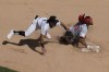 Cincinnati Reds' Will Benson, right, steals second as Chicago White Sox second baseman Nicky Lopez, left, applies a late tag during the sixth inning of a baseball game in Chicago, Sunday, April 14, 2024. (AP Photo/Nam Y. Huh)