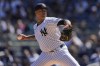 New York Yankees' Luis Gil pitches during the first inning of a baseball game against the Toronto Blue Jays Sunday, April 7, 2024, in New York. (AP Photo/Frank Franklin II)