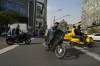 Motorbikes cross an intersection in downtown Tehran, Iran, Sunday, April 14, 2024. Israel on Sunday hailed its air defenses in the face of an unprecedented attack by Iran, saying the systems thwarted 99% of the more than 300 drones and missiles launched toward its territory. (AP Photo/Vahid Salemi)