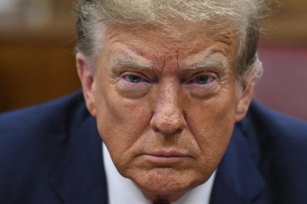 Former President Donald Trump attends the first day of his criminal trial, at Manhattan Criminal Court in New York City on April 15, 2024. (Angela Weiss/AFP via AP Pool)