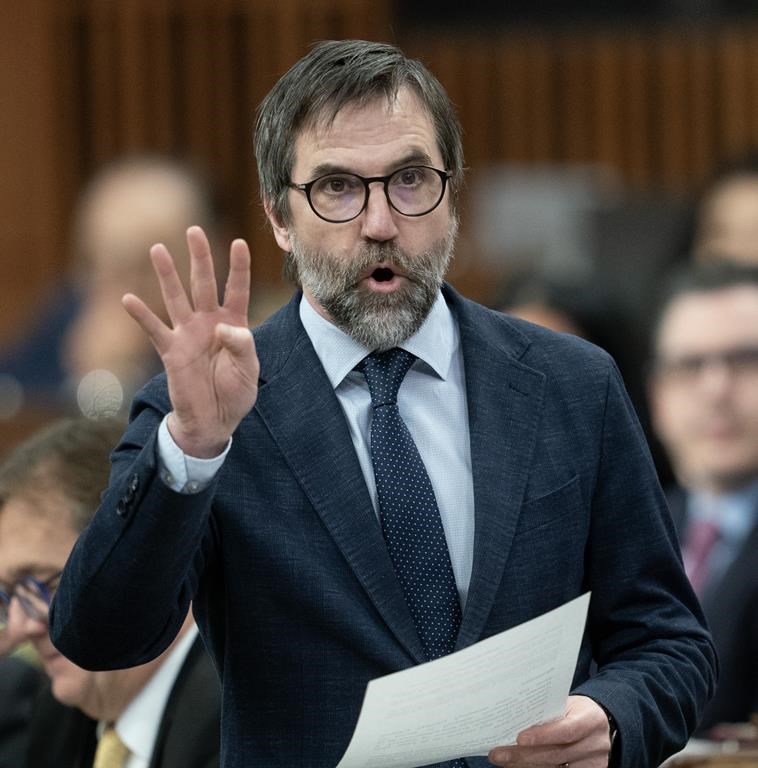 Minister of Environment and Climate Change Steven Guilbeault rises during Question Period in Ottawa Monday, April 15, 2024. Ontario has struck a deal with the federal government to proceed with the province’s Highway 413 project while working together to mitigate the effects on species at risk. THE CANADIAN PRESS/Adrian Wyld