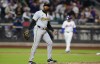 Pittsburgh Pirates pitcher Aroldis Chapman reacts after giving up hits against the New York Mets during the eighth inning of a baseball game, Monday, April 15, 2024, in New York. (AP Photo/Noah K. Murray)