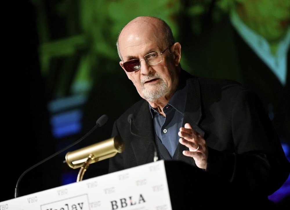 FILE - Author Salman Rushdie receives the Vaclav Havel Library Foundation's first ever lifetime achievement disturbing the peace award at the Vaclav Havel Center on Tuesday, Nov. 14, 2023, in New York. Rushdie's first book since the 2022 stabbing he thought might end his life is both explicit in the violence Rushdie sustains and heroic in the will to live that Rushdie retains. (Photo by Evan Agostini/Invision/AP, File)