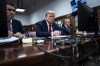 FILE - Former President Donald Trump sits in Manhattan criminal court with his legal team in New York, April 15, 2024. A new AP-NORC Center for Public Affairs Research poll found that only about one-third of U.S. adults think Trump did something illegal in the hush money case for which jury selection began Monday, while close to half think he did something illegal in the other three criminal cases pending against him. Still, about half of Americans would consider Trump unfit to serve as president if he is convicted. (Jabin Botsford/Pool Photo via AP)