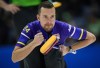 Alberta-Bottcher skip Brendan Bottcher watches his shot while playing Saskatchewan during the semifinal at the Brier, in Regina, on Sunday, March 10, 2024. Bottcher is looking for teammates after parting ways with the crew he has led for the past two years. THE CANADIAN PRESS/Darryl Dyck
