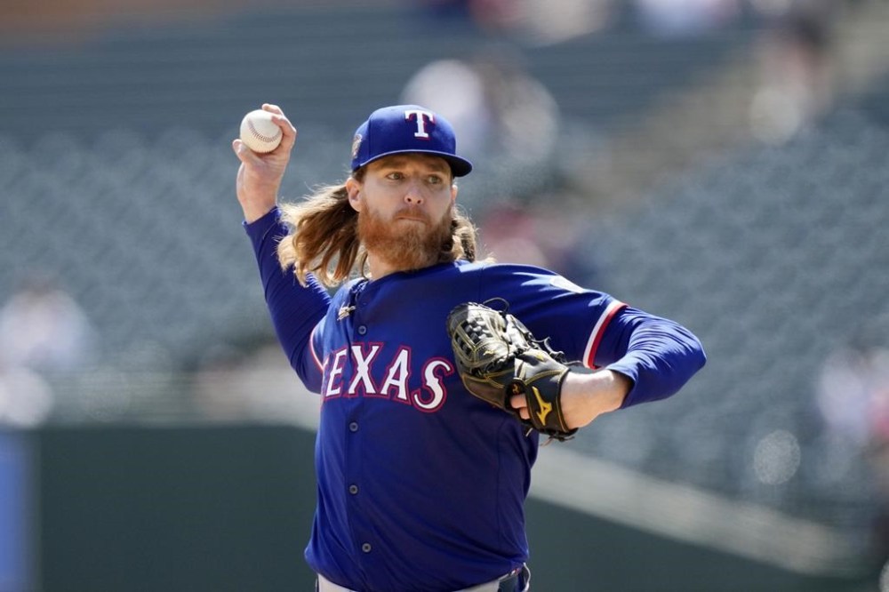 Texas Rangers pitcher Jon Gray throws during the second inning of a baseball game against the Detroit Tigers, Tuesday, April 16, 2024, in Detroit. (AP Photo/Carlos Osorio)