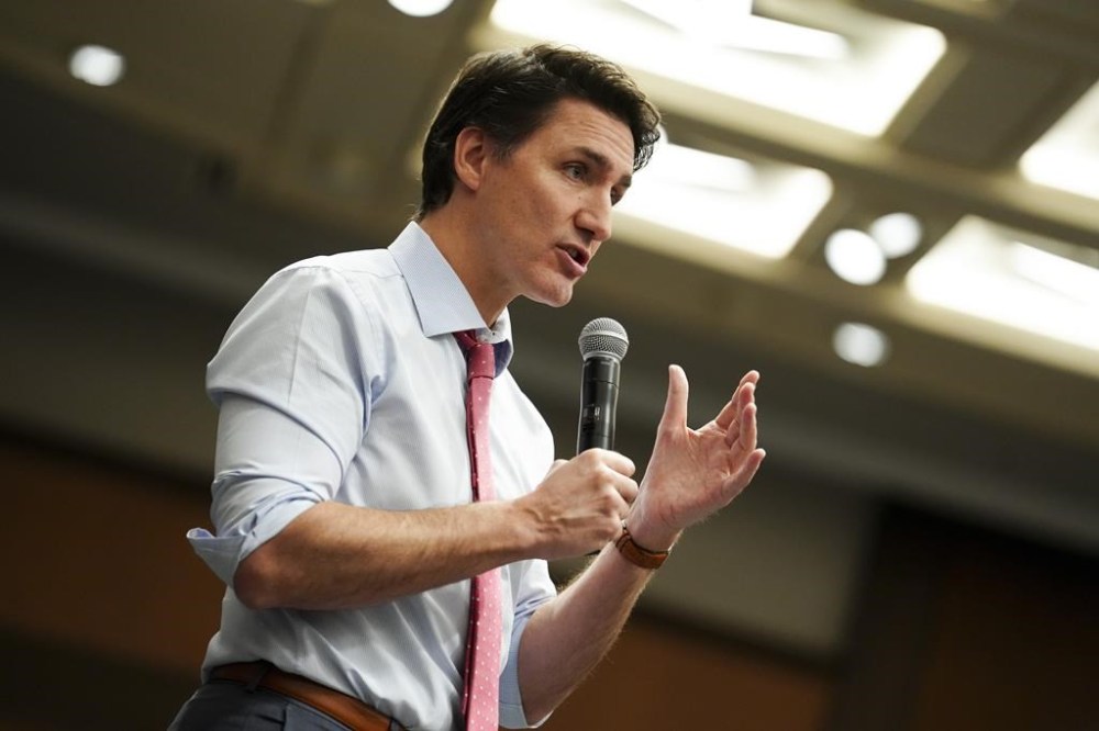 Prime Minister Justin Trudeau addresses caucus during a meeting on Parliament Hill in Ottawa on Wednesday, April 17, 2024. THE CANADIAN PRESS/Sean Kilpatrick