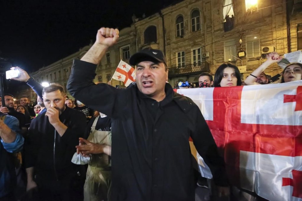 A demonstrator gestures as he shouts during a rally outside the parliament building in Tbilisi, Georgia, on Thursday, April 18, 2024, to protest against