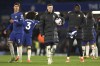 Chelsea's Cole Palmer, centre, walks after the English Premier League soccer match between Chelsea and Everton at Stamford Bridge stadium in London, Monday, April 15, 2024. (AP Photo/Ian Walton)