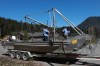 Deckhands from the Homalco First Nations ready a seine boat out front of the Ehattesaht First Nation's band office in Zeballos, B.C., Thursday, April 18, 2024. The arrival of a large seine fishing vessel capable of casting a net strong enough to hold an almost 700 kilogram killer whale calf has arrived in Zeballos, B.C. to participate in the expected latest attempt to rescue a young orca stranded in a remote tidal lagoon. THE CANADIAN PRESS/Chad Hipolito