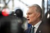Lithuania's President Gitanas Nauseda speaks with the media as he arrives for an EU summit in Brussels, Thursday, April 18, 2024. European Union leaders vowed on Wednesday to ramp up sanctions against Iran as concern grows that Tehran's unprecedented attack on Israel could fuel a wider war in the Middle East. (AP Photo/Harry Nakos)