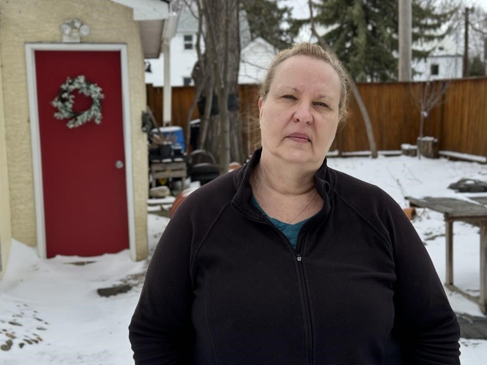 Nuelle Novik poses for a portrait at her home in Regina, Friday, April 19, 2024. Novik, an associate professor at the University of Regina, led a research project, looking at the state of rural health care in Saskatchewan, finding there have been hundreds of service disruptions and staffing shortages. THE CANADIAN PRESS/Jeremy Simes