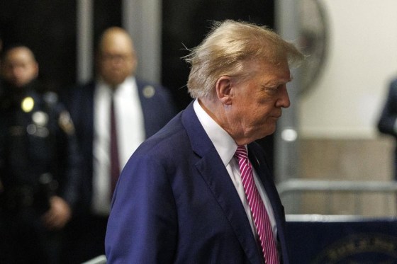 Former U.S. president Donald Trump arrives at his trial Friday at Manhattan Criminal Court in New York. (Sarah Yenesel / Pool / The Associated Press)