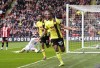 Burnley's Lorenz Assignon celebrates scoring their side's second goal of the game during the English Premier League soccer match between Burnley FC and Sheffield United at Bramall Lane, Sheffield, England, Saturday April 20, 2024. (Danny Lawson/PA via AP)