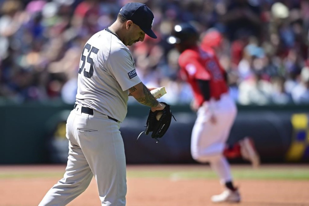 New York Yankees starting pitcher Nestor Cortes waits for Cleveland Guardians' Gabriel Arias to run the bases after hitting a solo home run in the fifth inning of a baseball game, Sunday, April 14, 2024, in Cleveland. (AP Photo/David Dermer)