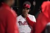 Philadelphia Phillies pitcher Ricardo Pinto wipes his face after being pulled during the ninth inning of a baseball game against the Chicago White Sox, Saturday, April 20, 2024, in Philadelphia. (AP Photo/Matt Slocum)