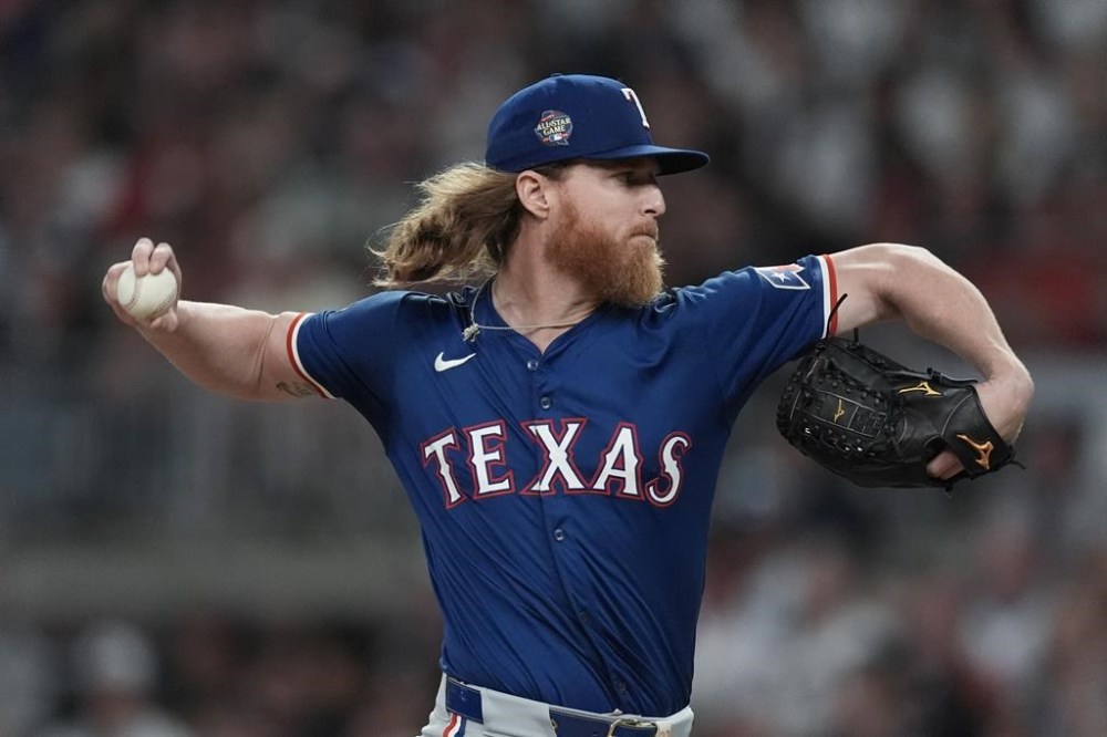 Texas Rangers relief pitcher Jon Gray works in the sixth inning of a baseball game against the Atlanta Braves Saturday, April 20, 2024, in Atlanta. (AP Photo/John Bazemore)