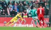 Werder's Marvin Ducksch, centre, scores his side's first goal of the game during the Bundesliga soccer match between Werder Bremen and VfB Stuttgart at the Weserstadion stadium in Bremen, Germany, Sunday April 21, 2024. (Carmen Jaspersen/dpa via AP)