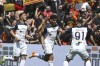Lecce's Valentin Gendrey, center, celebrates scoring with teammates during the Serie A soccer match between Sassuolo and Lecce at Mapei Stadium, Reggio Emilia, Italy, Sunday April 21, 2024. (Gianni Santandrea/LaPresse via AP)