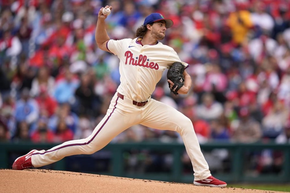 Philadelphia Phillies' Aaron Nola pitches during the first inning of a baseball game against the Chicago White Sox, Sunday, April 21, 2024, in Philadelphia. (AP Photo/Matt Slocum)