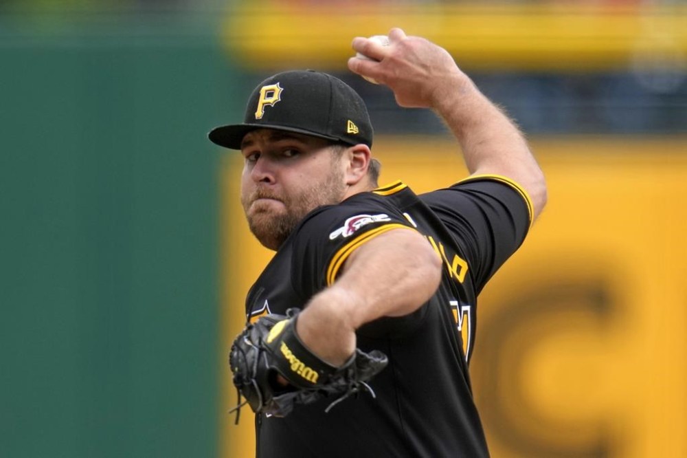 Pittsburgh Pirates relief pitcher David Bednar delivers during the ninth inning of a baseball game against the Boston Red Sox in Pittsburgh, Sunday, April 21, 2024. (AP Photo/Gene J. Puskar)