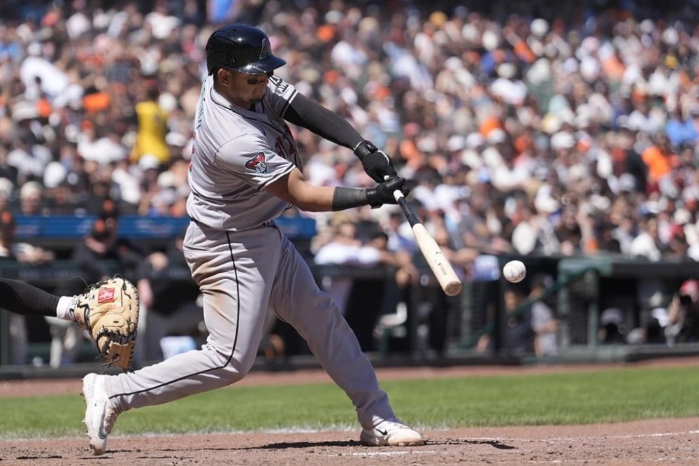 Arizona Diamondbacks' Gabriel Moreno hits a two-run single against the San Francisco Giants during the sixth inning of a baseball game in San Francisco, Sunday, April 21, 2024. (AP Photo/Jeff Chiu)