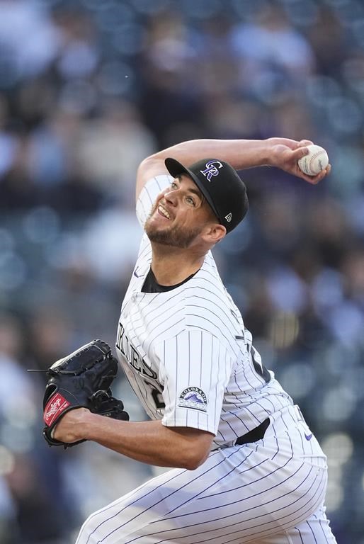 Colorado Rockies starting pitcher Peter Lambert works against the Seattle Mariners in the first inning of the second game of a baseball doubleheader Sunday, April 21, 2024, in Denver. (AP Photo/David Zalubowski)