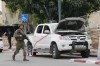 FILE - Israeli soldier walks by a pickup truck used by Palestinian militants in Sderot, Israel, on Saturday, Oct. 7, 2023. The Israeli military said Monday April 22, 2024 that the head of its intelligence corps has resigned over Hamas’ Oct. 7 attack. Aharon Haliwa, the head of Israel’s military intelligence, becomes the first senior Israeli figure to step down over the failures surrounding Hamas’ attack. (AP Photo/Ohad Zwigenberg, File)