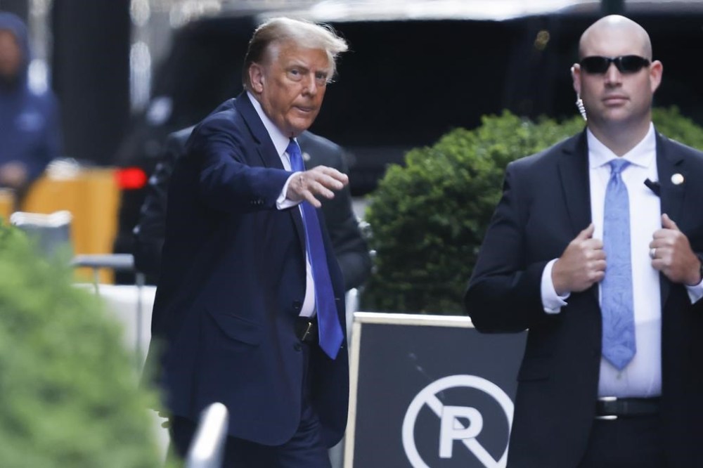 Former president Donald Trump leaves Trump Tower on his way to Manhattan criminal court, Monday, April 22, 2024, in New York. Opening statements in Donald Trump's historic hush money trial are set to begin. Trump is accused of falsifying internal business records as part of an alleged scheme to bury stories he thought might hurt his presidential campaign in 2016. (AP Photo/Stefan Jeremiah)