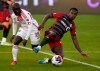 Toronto FC midfielder Richie Laryea (22) vies for the ball with New England Revolution midfielder Ema Boateng (18) during MLS soccer action in Toronto on Saturday May 6, 2023. Toronto FC is in discussions to bring in a player and to move one out in advance of Tuesday's closing of the MLS's primary transfer window.THE CANADIAN PRESS/Frank Gunn