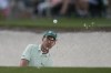 Captain Mike Weir named Ernie Els, Trevor Immelman, Geoff Ogilvy and Camilo Villegas his assistants on the International Team for the upcoming Presidents Cup. Weir, of Canada, hits from the bunker on the ninth hole during the first round at the Masters golf tournament at Augusta National Golf Club Thursday, April 11, 2024. THE CANADIAN PRESS/AP-Charlie Riedel