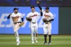 Cleveland Guardians' Ramón Laureano, Steven Kwan and Tyler Freeman, from left, celebrate the team's win over the Oakland Athletics in a baseball game Saturday, April 20, 2024, in Cleveland. (AP Photo/Nick Cammett)
