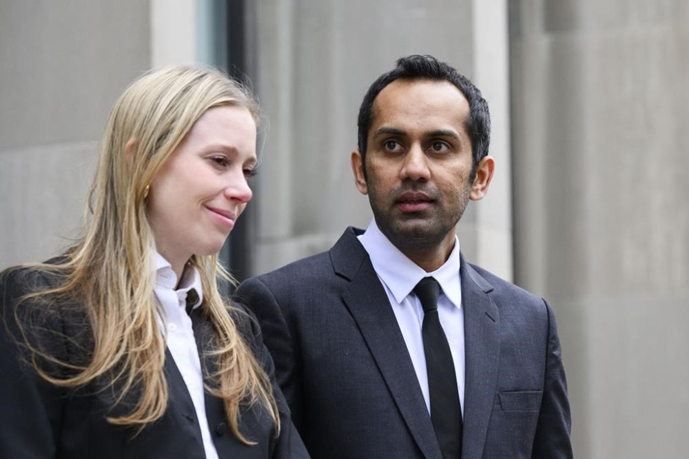 Umar Zameer reacts beside lawyer Alexandra Heine during a press conference following his not-guilty verdict, in Toronto, Sunday, April 21, 2024. THE CANADIAN PRESS/Christopher Katsarov