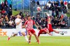 Olympiacos' Theofanis Bakoulas, right, scores during the Youth League Final against AC Milan at the Colovray Sports Centre in Nyon, Switzerland, Monday, April 22, 2024. (Salvatore Di Nolfi/Keystone via AP)