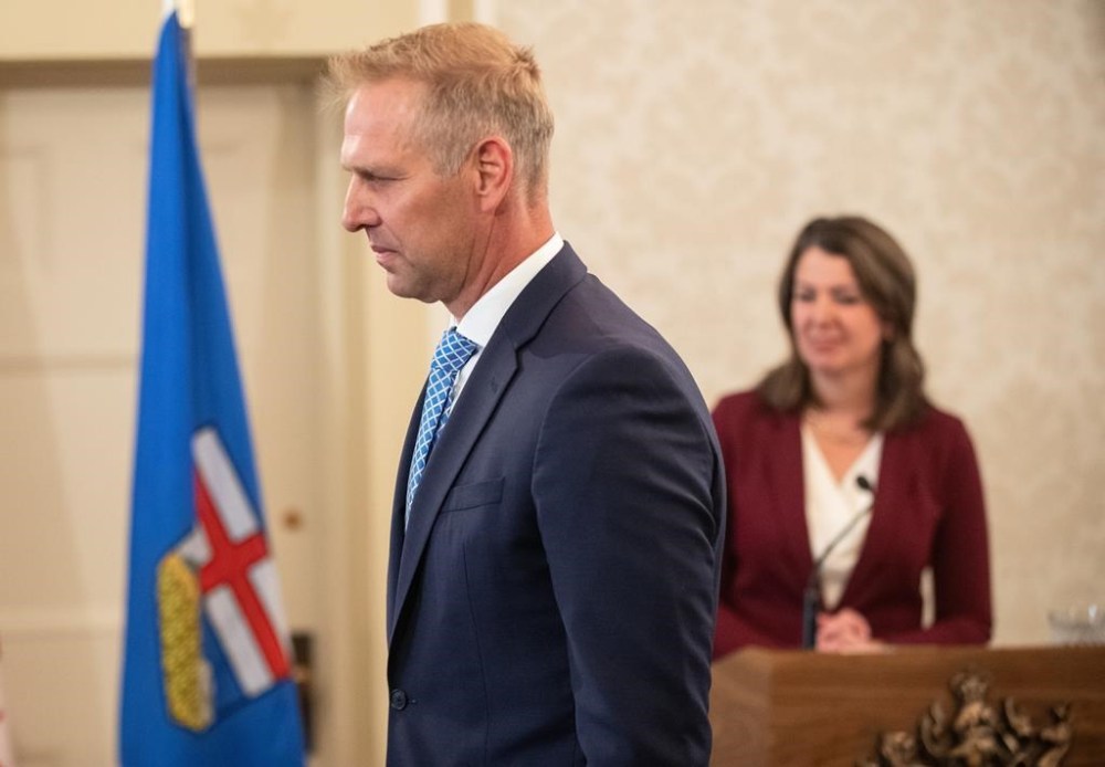 The Alberta government is stepping in to stop Calgary residents from being forced to pay hefty surcharges on their power bills. Utilities Minister Nathan Neudorf is sworn into cabinet in Edmonton, Friday, June 9, 2023. THE CANADIAN PRESS/Jason Franson