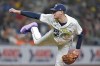 Tampa Bay Rays' Pete Fairbanks follows through on a pitch to the San Francisco Giants during the ninth inning of a baseball game Friday, April 12, 2024, in St. Petersburg, Fla. (AP Photo/Chris O'Meara)