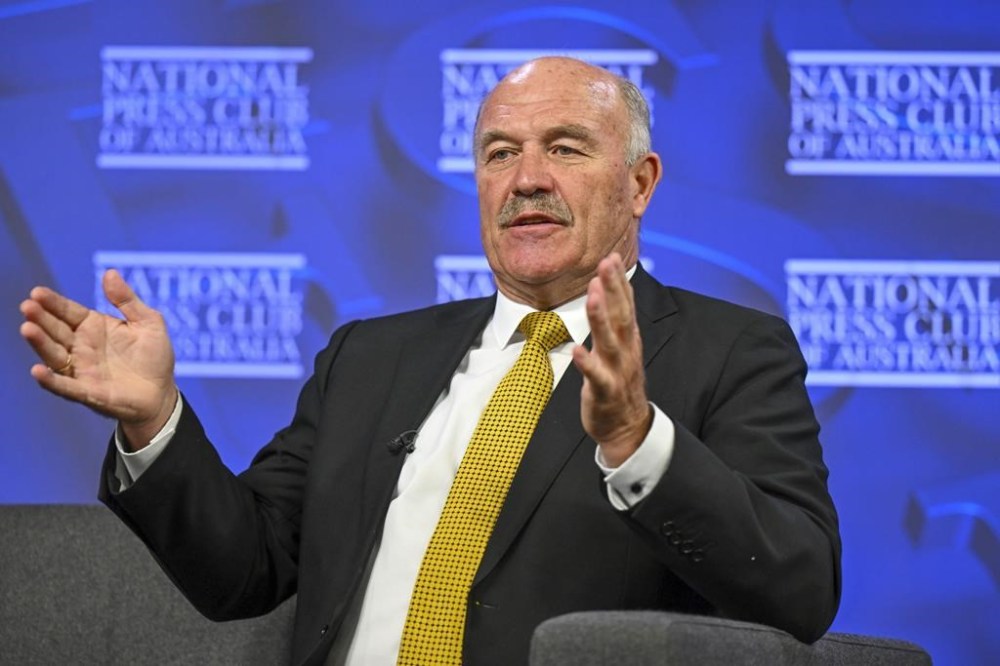 Former Australian rugby league player Wally Lewis, addresses the National Press Club in Canberra, Australia, Tuesday, April 23, 2024. Lewis, a legendary rugby player of the 1980s has cited the fear and anxiety that has come into his life among the reason for urging the Australian government to fund support services and education about chronic traumatic encephalopathy (CTE). (Lukas Coch/AAP Image via AP)
