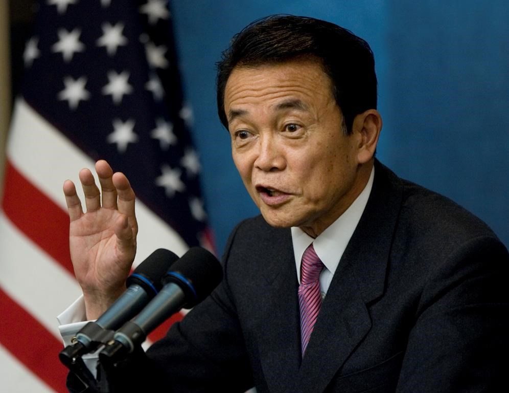FILE - Then Prime Minister Taro Aso of Japan speaks with reporters during a news conference at the end of the financial summit in Washington, Nov. 15, 2008. Former President Donald Trump is meeting with another foreign leader while he’s in New York for his criminal hush money trial. The presumptive GOP nominee will host former Japanese prime minister Taro Aso at Trump Tower Tuesday, according to two people familiar with the plans. (AP Photo/J. Scott Applewhite, File)