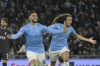 Lazio's Taty Castellanos, front left, celebrates after scoring his side's second goal during the Italian Cup semi-final soccer match between Lazio and Juventus at Rome's Olympic Stadium, Italy, Tuesday, April 23, 2024. (Fabrizio Corradetti/LaPresse via AP)