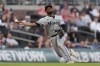 Miami Marlins third baseman Otto Lopez throws late to first base after misplaying ground ball hit by Atlanta Braves' Adam Duvall in the second inning of a baseball game Tuesday, April 23, 2024, in Atlanta. Lopez was charged with an error. (AP Photo/John Bazemore)