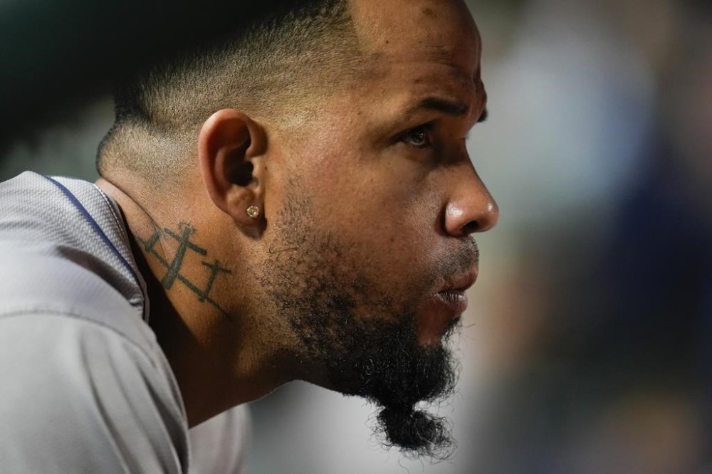 Houston Astros' José Abreu watches from the dugout during the eighth inning of a baseball game against the Chicago Cubs, Tuesday, April 23, 2024, in Chicago. (AP Photo/Erin Hooley)