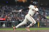 San Francisco Giants' Jung Hoo Lee runs up the first base line while grounding out against the New York Mets during the fifth inning of a baseball game in San Francisco, Tuesday, April 23, 2024. (AP Photo/Jeff Chiu)