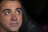 Barcelona's head coach Xavi Hernandez gestures as he attends the start of the Spanish La Liga soccer match between Real Madrid and Barcelona at the Santiago Bernabeu stadium in Madrid, Spain, Sunday, April 21, 2024. (AP Photo/Manu Fernandez)
