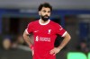 Liverpool's Mohamed Salah standing on the pitch during the English Premier League soccer match between Everton and Liverpool at the Goodison Park stadium in Liverpool, Britain, Wednesday, April 24, 2024. (Peter Byrne/PA via AP)